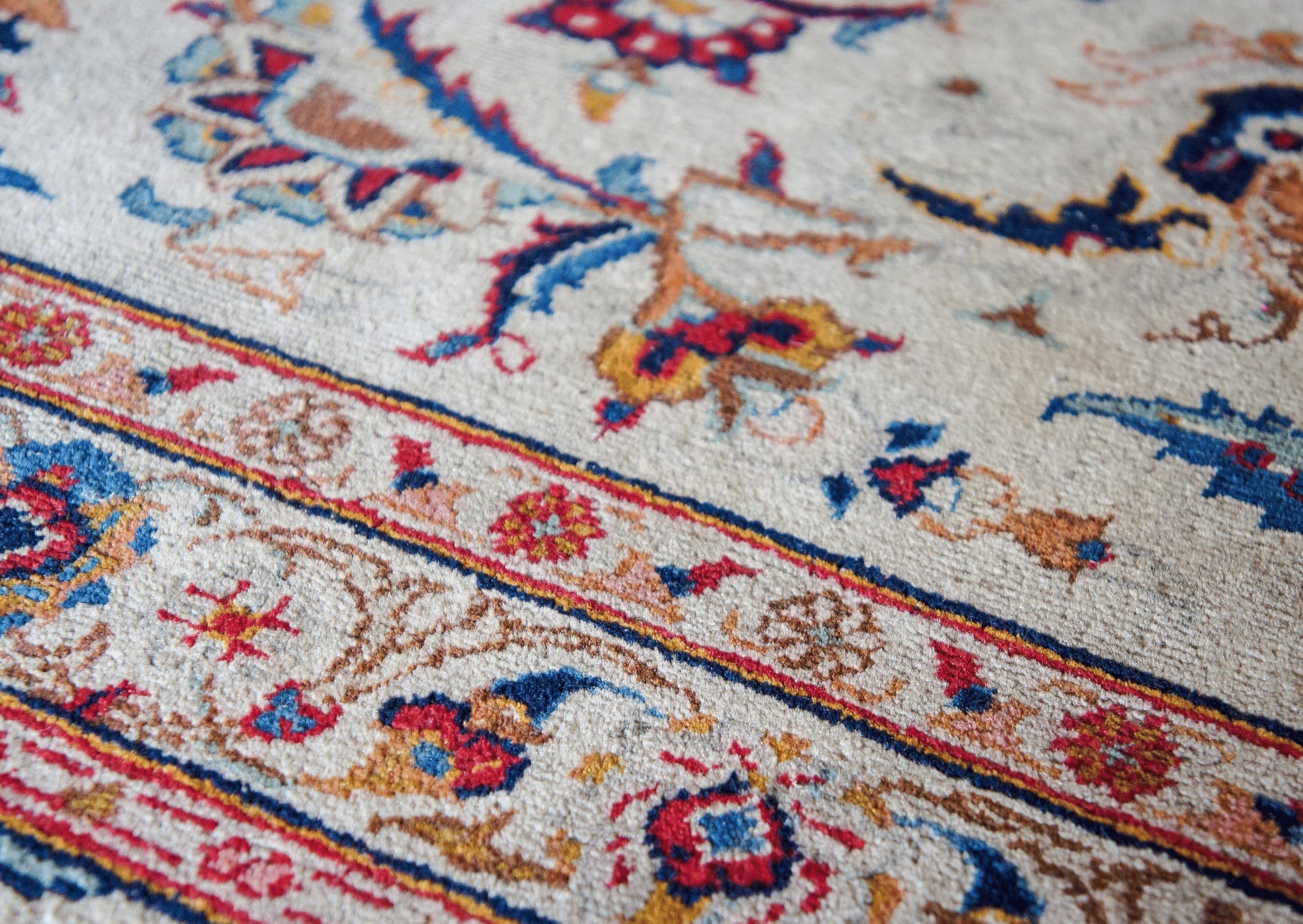 Persian rug being cleaned by hand by The Carpet Guys specialist technician